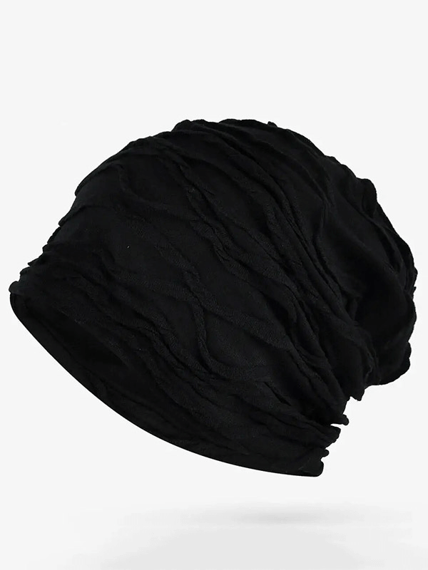 Unisex windproof warm baggy beanie in black, solid pattern, cotton material, perfect for outdoor activities and windy conditions.