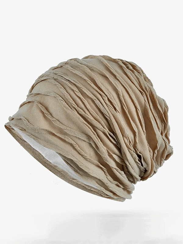 Unisex windproof warm baggy solid beige beanie for outdoor activities, made from cotton for comfort and protection in windy conditions.
