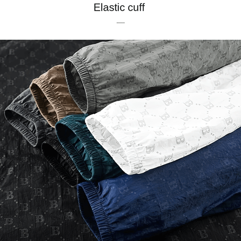 Elastic cuff detail of UV sun protection skin thin jacket with letter B print in various colors.