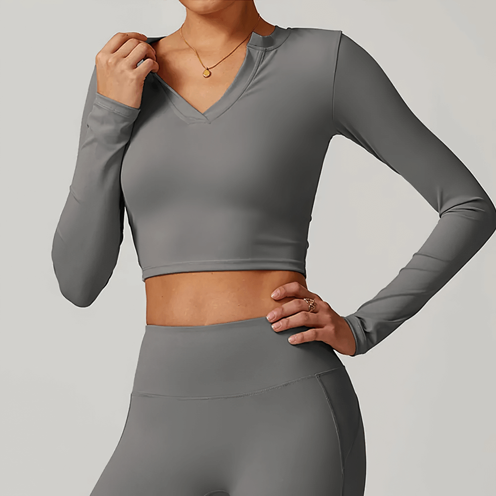 Women's V-Neck Yoga Long Sleeve Crop Top in grey, perfect for running, yoga, and fitness with stretchy, breathable fabric.