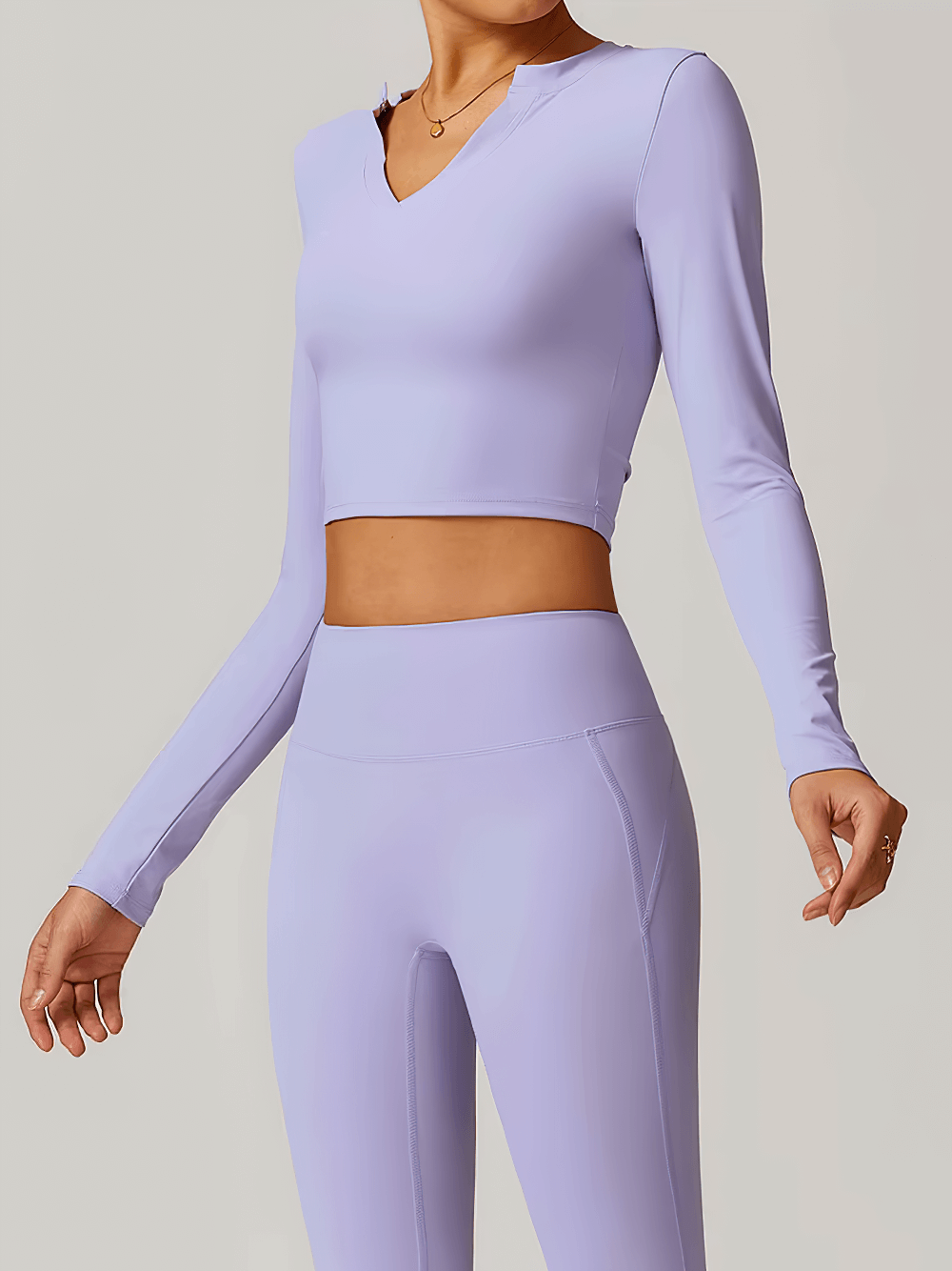 Lavender V-Neck Yoga Long Sleeve Crop Top for Women, ideal for fitness, featuring breathable, quick-dry fabric and stylish fit.