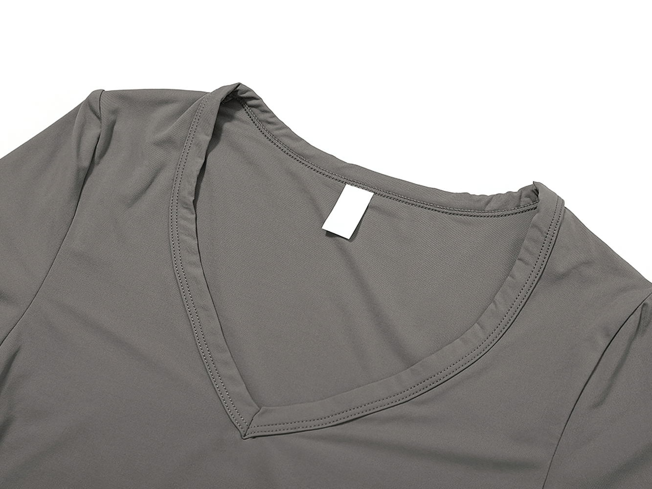 Women's gray V-neck yoga tee in spandex blend, ideal for fitness enthusiasts. Breathable, quick-drying, anti-pilling short sleeve shirt.