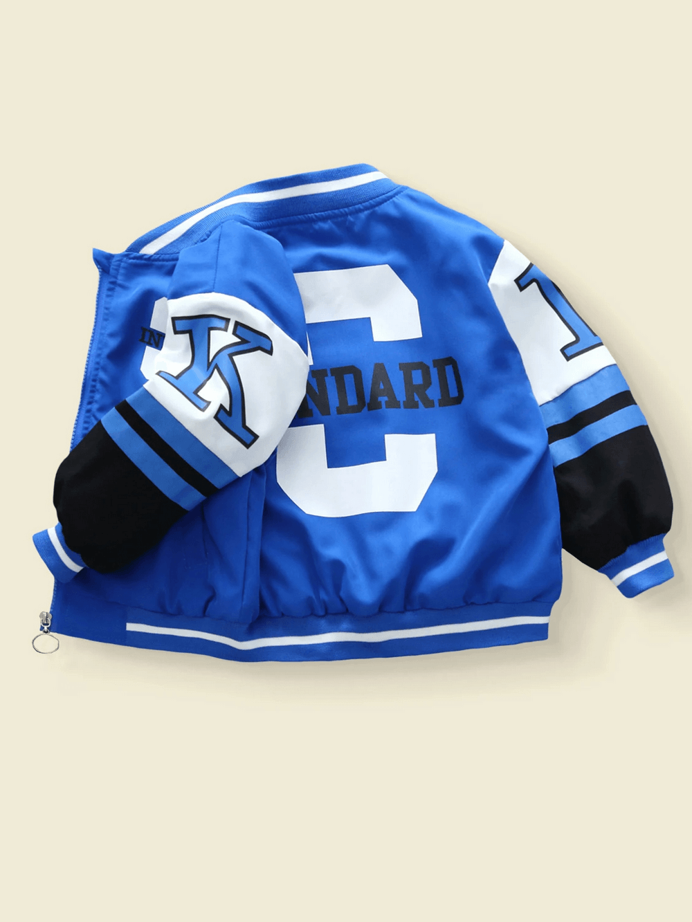 Blue varsity bomber jacket with bold 'C' graphic and ribbed cuffs for kids, featuring sporty lettering and graphic prints.