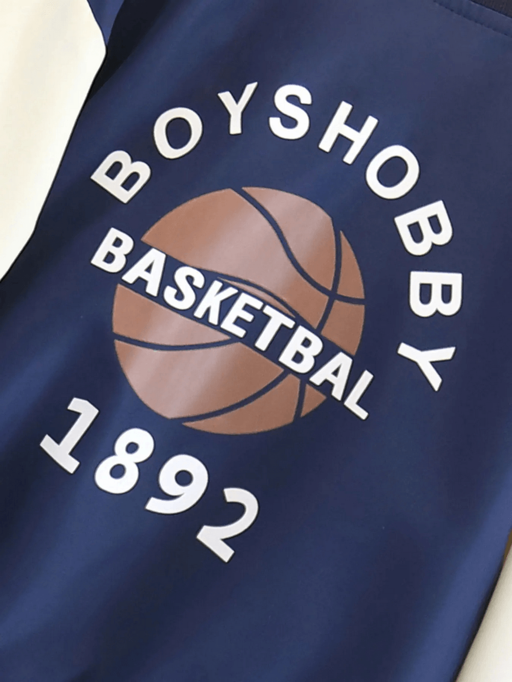Children's varsity basketball jacket featuring 'Boyshobby Basketball 1892' print in teal and white, sporty and stylish.