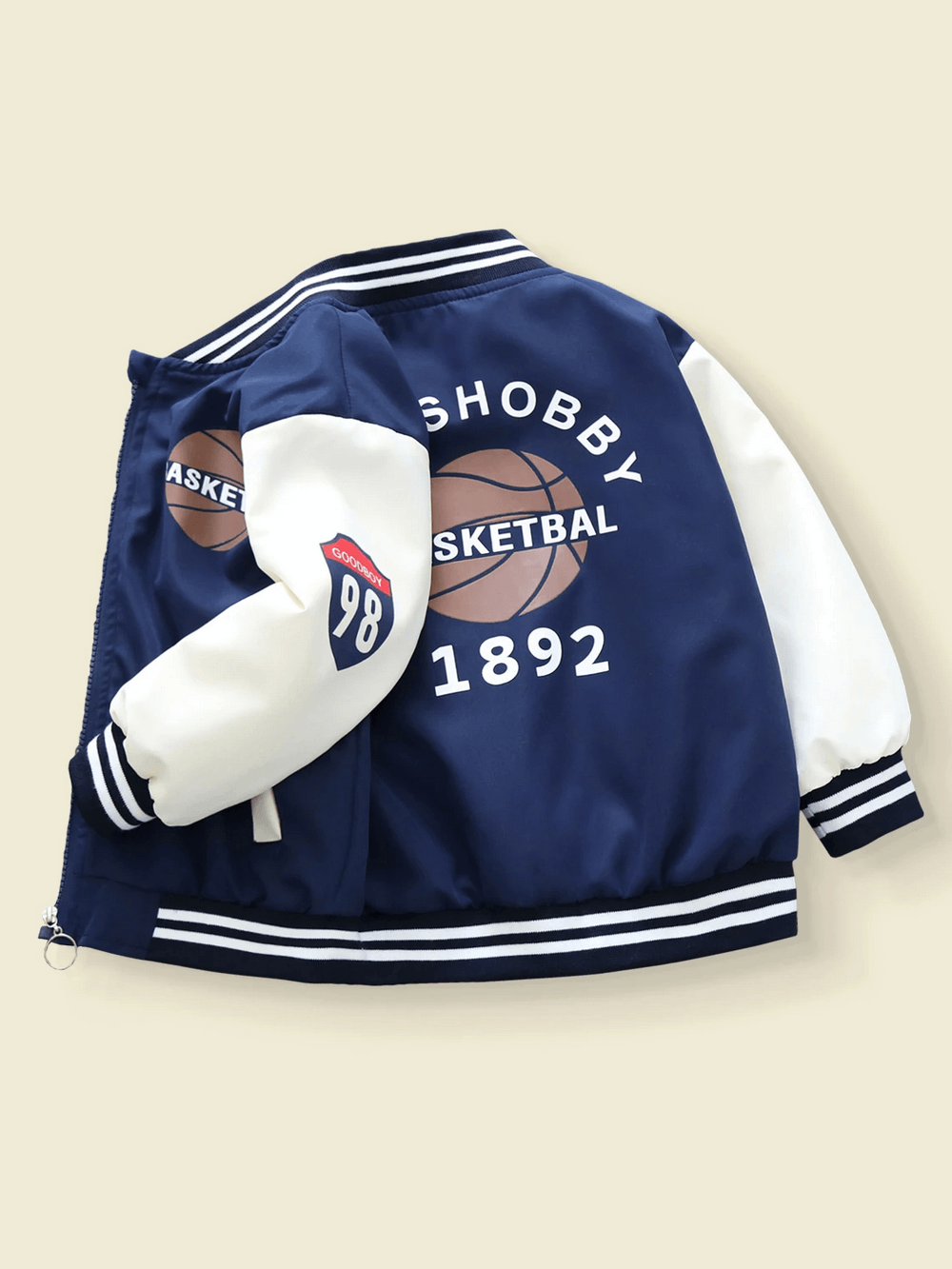 Children’s varsity basketball jacket in teal and white with sporty print, stylish zip-up and ribbed cuffs, model SF3116.