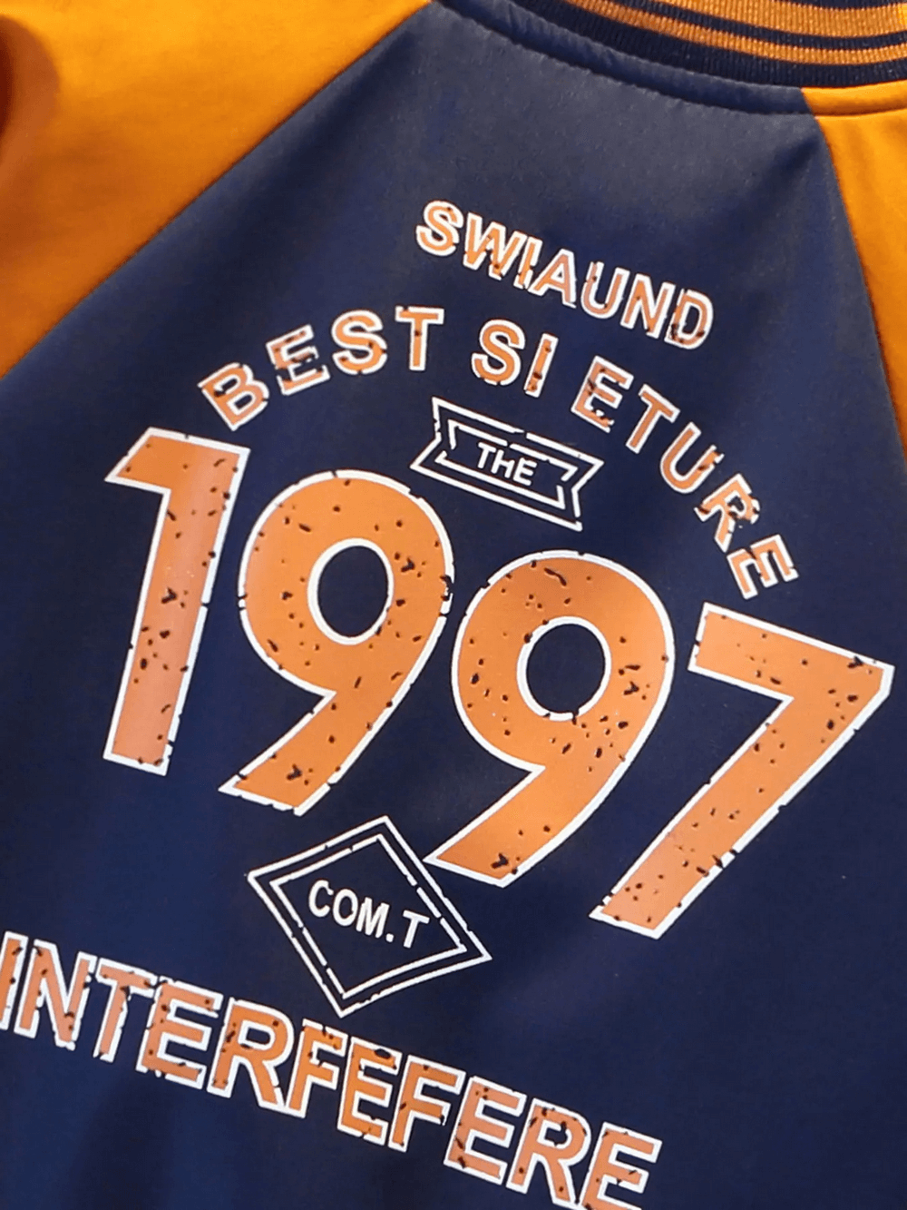 Navy and orange varsity jacket with bold '1997' and collegiate lettering