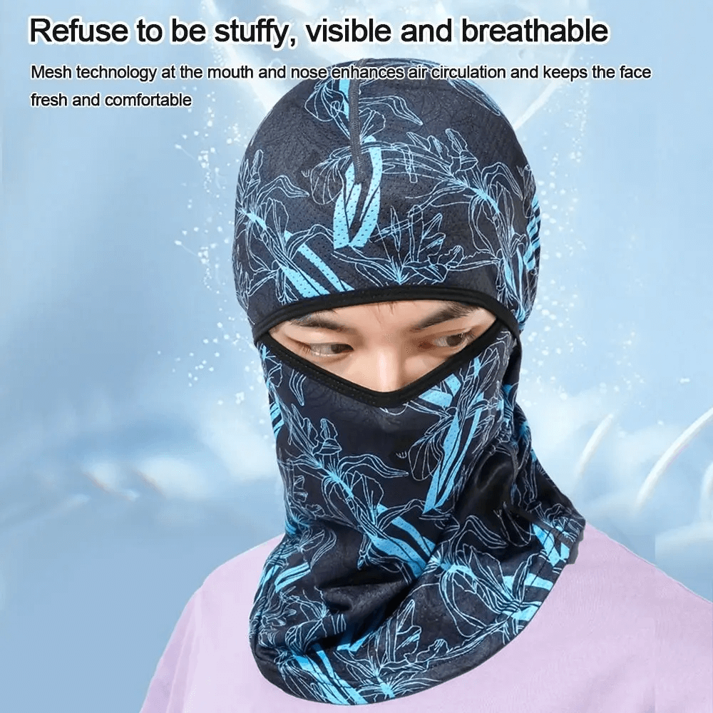Cyclist wearing versatile polyester balaclava with blue print design, ideal for helmet lining or hiking, breathable and protective gear.