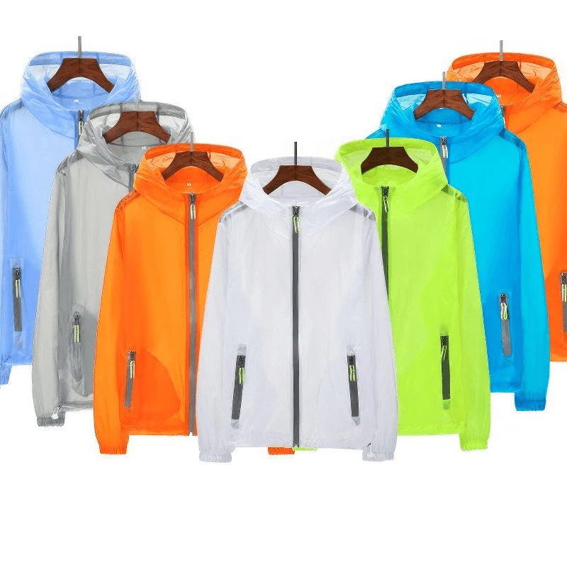 Colorful lightweight hiking jackets on hangers, perfect for trekking adventures, featuring breathable and windproof material.