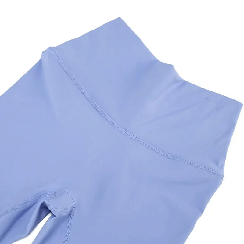 Light blue yoga leggings from Versatile Women's Activewear Set SF2080, showcasing high waist and breathable nylon fabric for fitness.