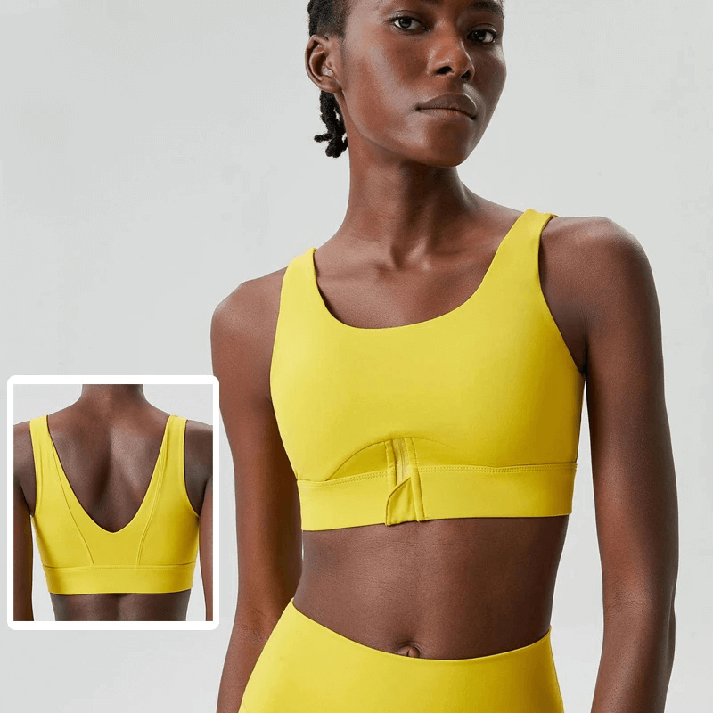Person wearing Vibrant Yellow Yoga Fitness Bra - Breathable Gym Crop Top SF2092, showcasing front and back design with scoop neck.