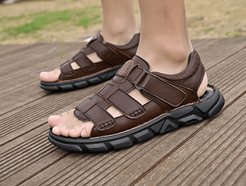 Brown vintage men's sandals for outdoor trekking on a wooden deck, featuring soft bottom and durable rubber outsole, model SF1340.