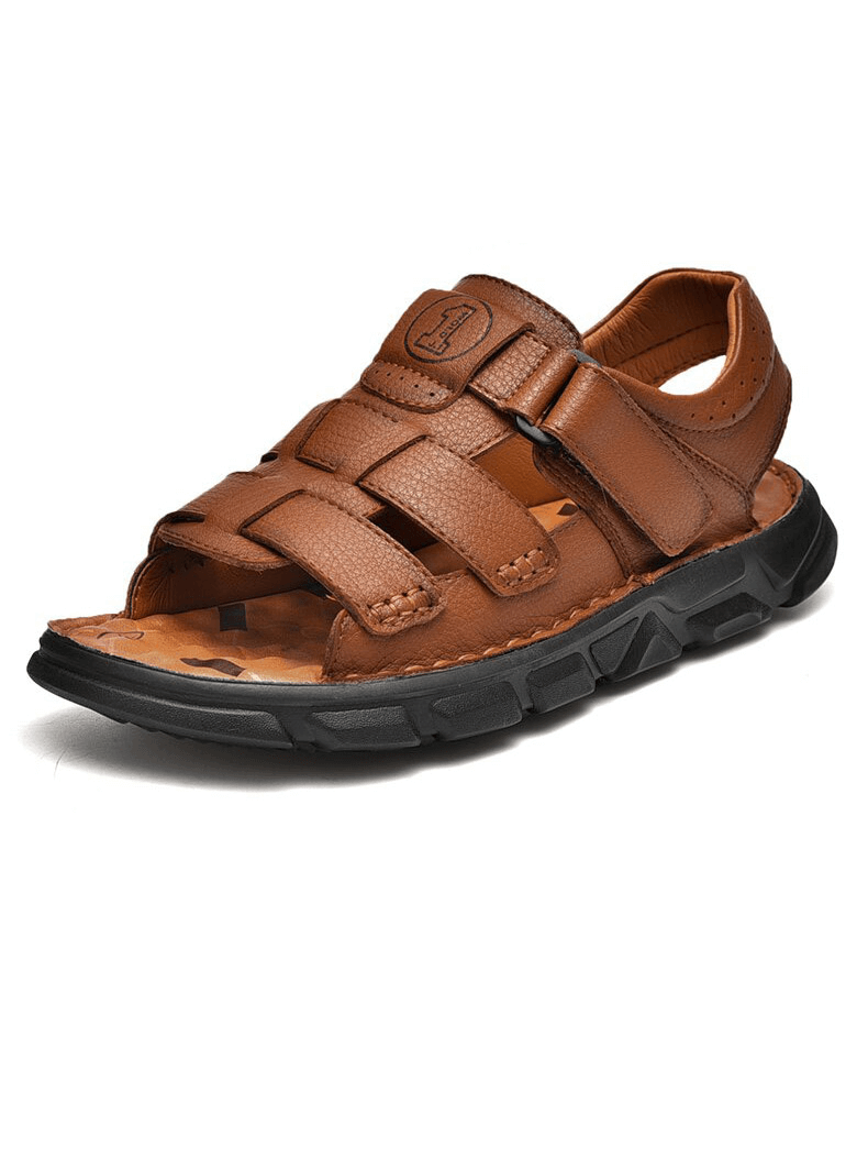 Vintage men's leather sandals with soft bottom, perfect for trekking; features breathable lining and rubber outsole for traction.