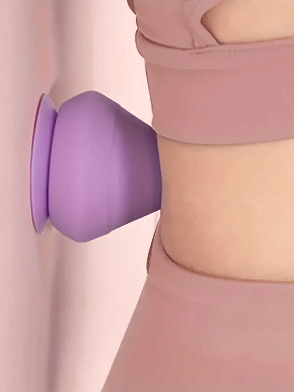 Wall-mounted purple muscle massager with suction cup in use for relieving back pain and enhancing relaxation.