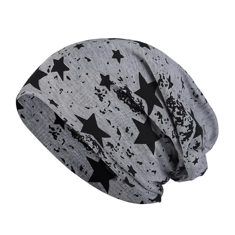 Warm knitted unisex beanie with star pattern, perfect for sports or casual wear, made of cotton for all-season comfort.