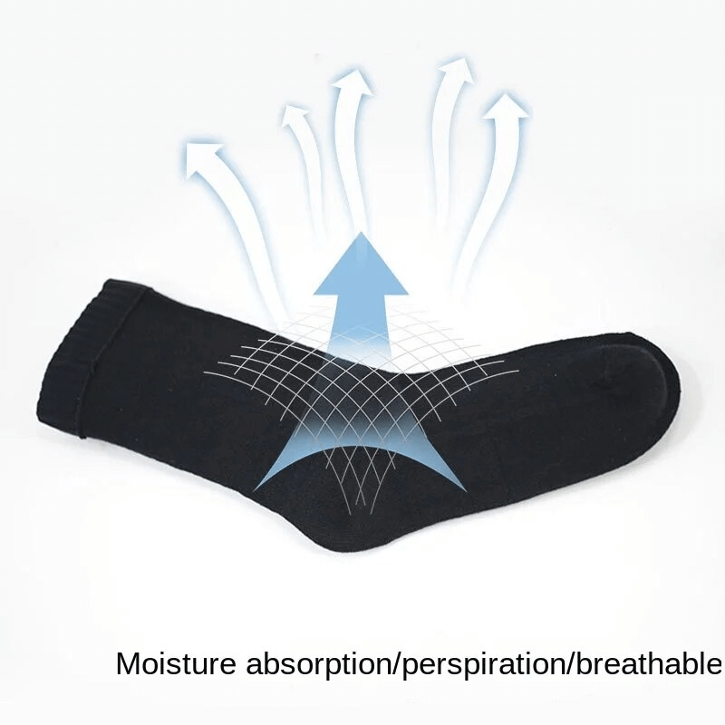 Black waterproof high socks demonstrating moisture absorption and breathability features.
