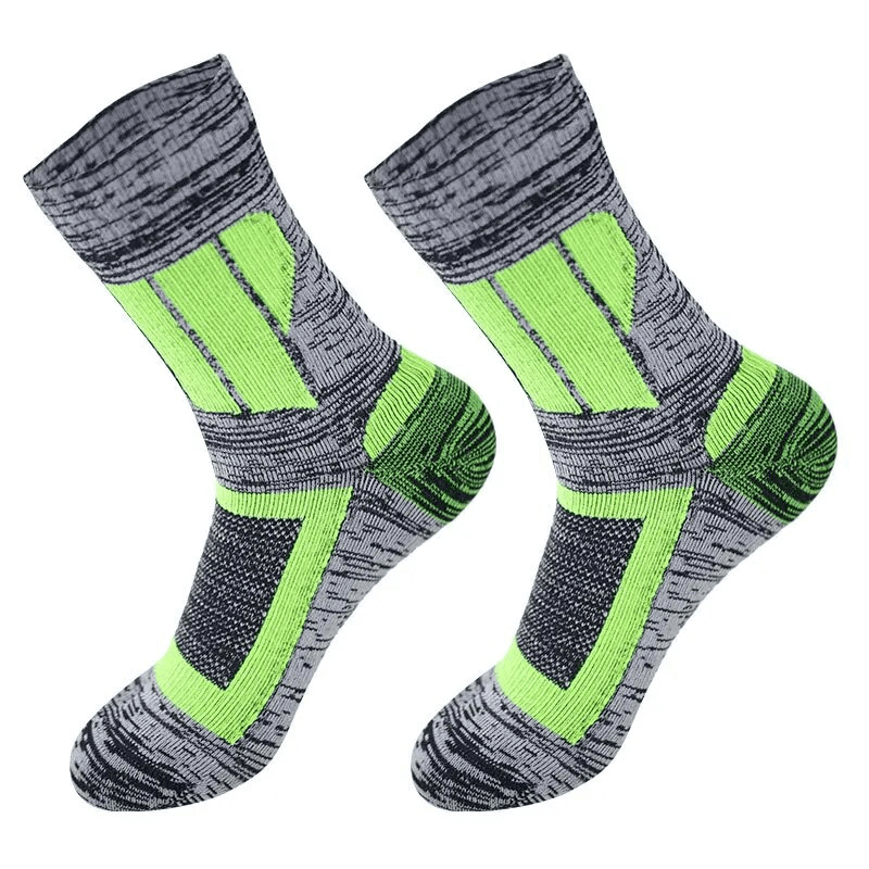 Gray and green waterproof knee-high socks for men and women, ideal for hiking and camping with breathable, anti-bacterial cotton fabric.