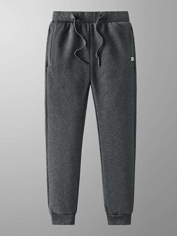 Warm Sports Men's Joggers Pants with cuffs and pockets, featuring adjustable drawstring, mid-waist fit, in dark gray fabric.