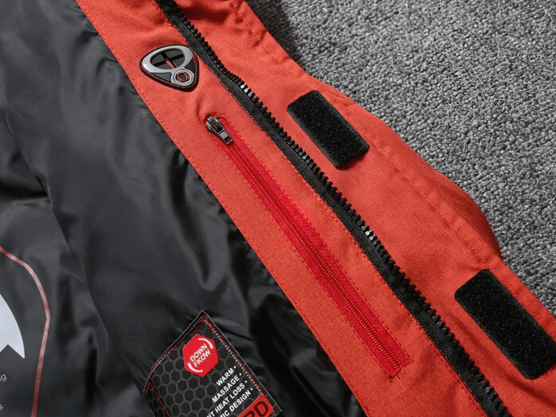 Close-up of red ski suit zipper, highlights windproof and waterproof features of Warm Ski Suit SF1783.