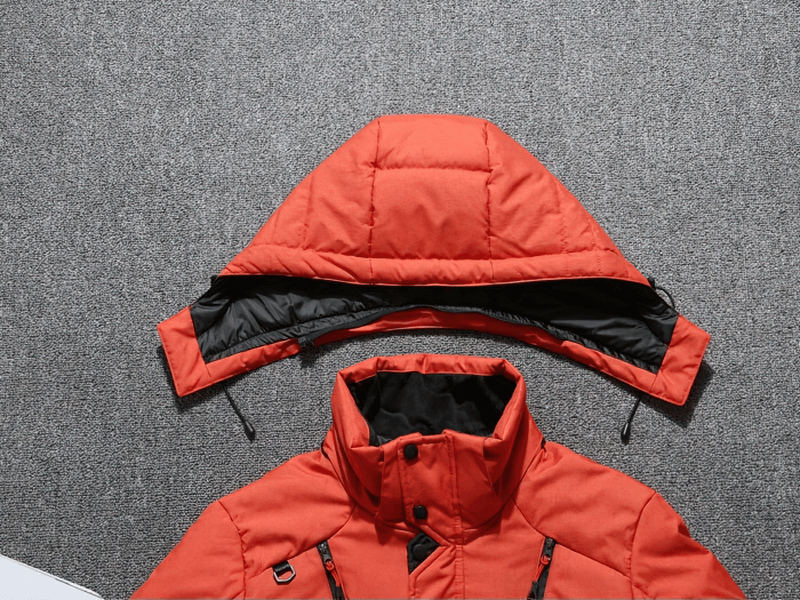 Warm windproof waterproof ski suit SF1783 in vibrant orange, featuring detachable hood for ultimate winter sports protection and comfort.