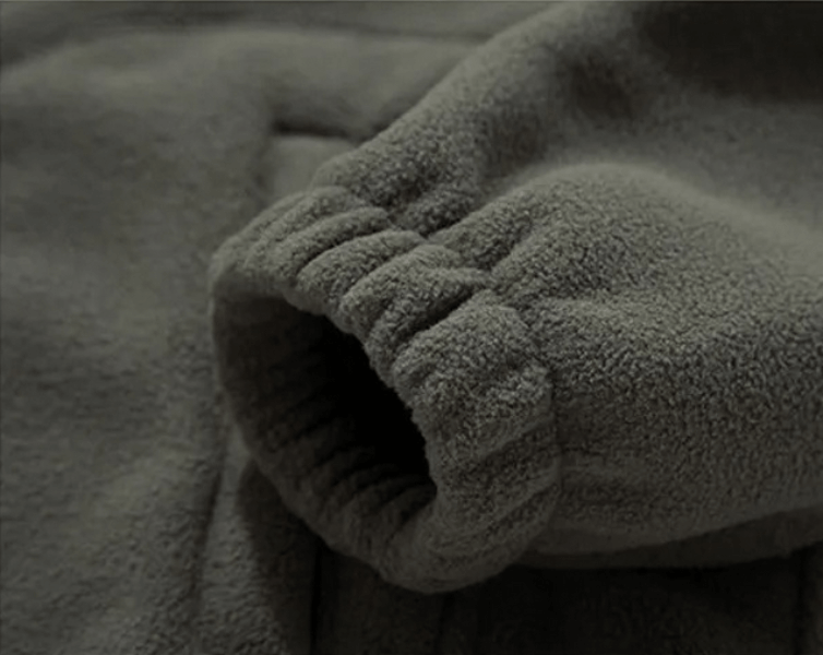 Close-up of Warmed Solid Color Men's Jacket sleeve showcasing plush fabric texture