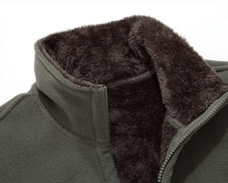 Warm solid color men's jacket with stand collar, featuring soft cotton fabric and a cozy fleece lining. Perfect for stylish warmth.