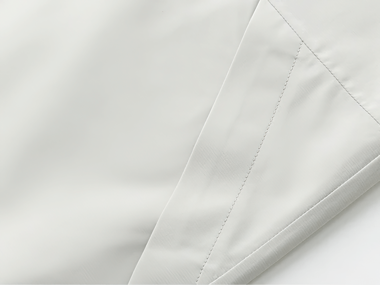 Close-up of fabric detail on Waterproof and Windproof Outdoor Jacket - SF3685 showcasing its smooth texture.