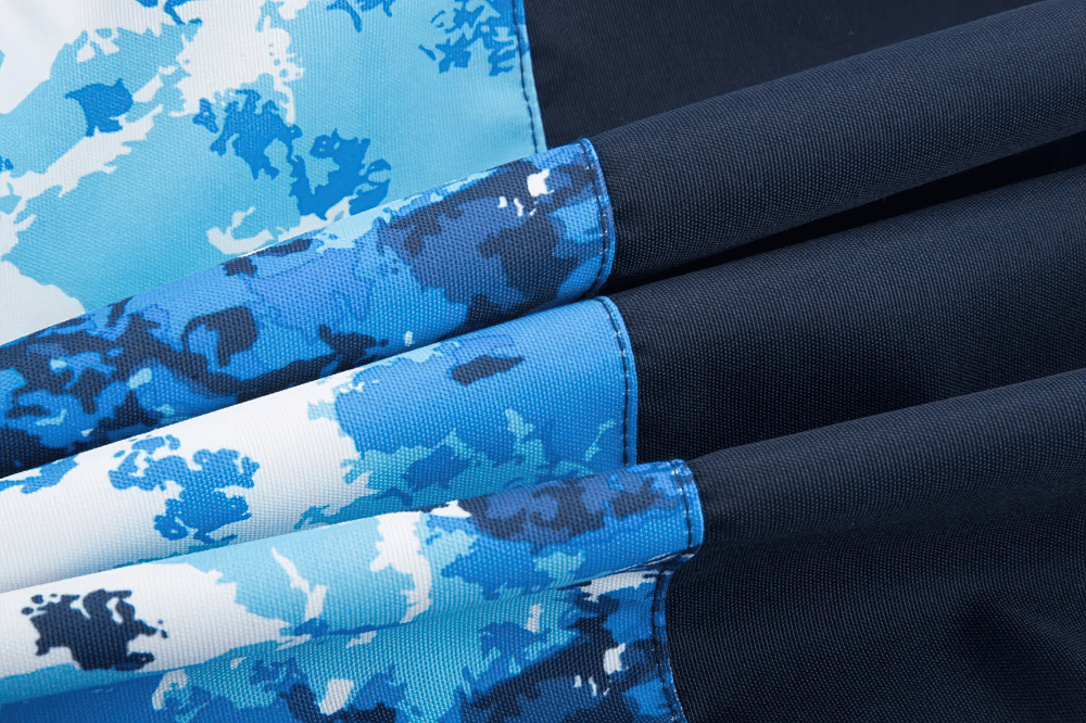 Close-up of waterproof fleece lined jacket fabric showcasing the vibrant blue design and water-resistant material.