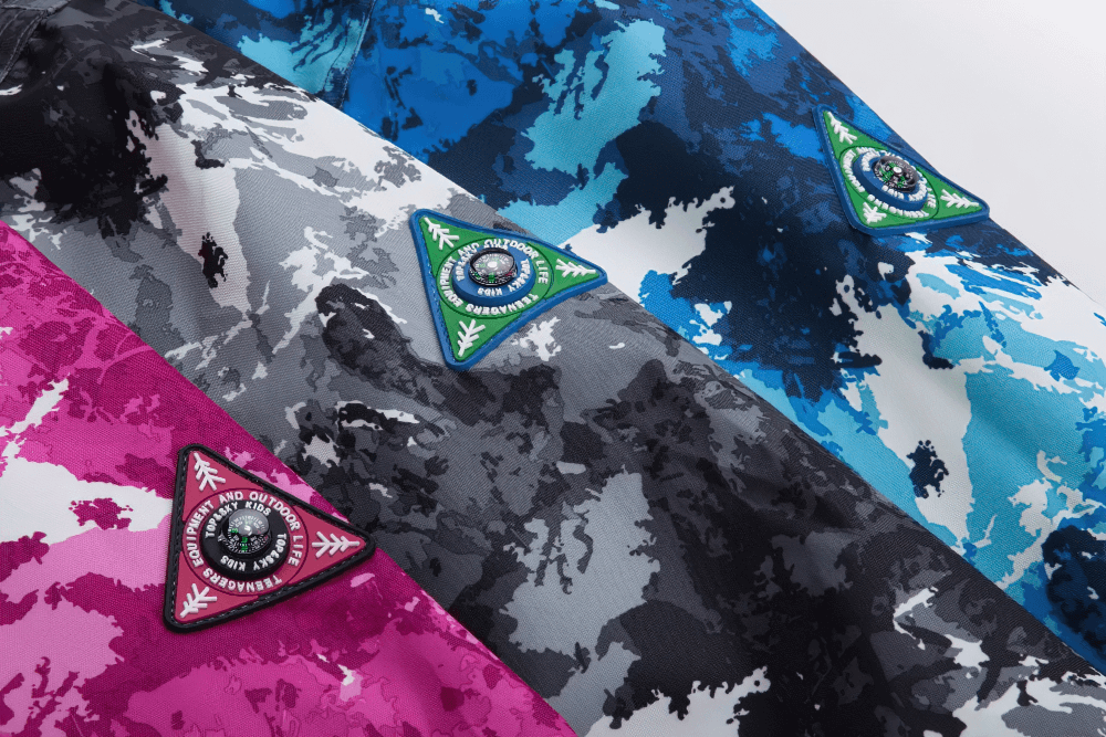 Colorful patterns on waterproof jackets showcasing rugged outdoor style for Waterproof Fleece Lined Jacket with Detachable Hood - SF3575.