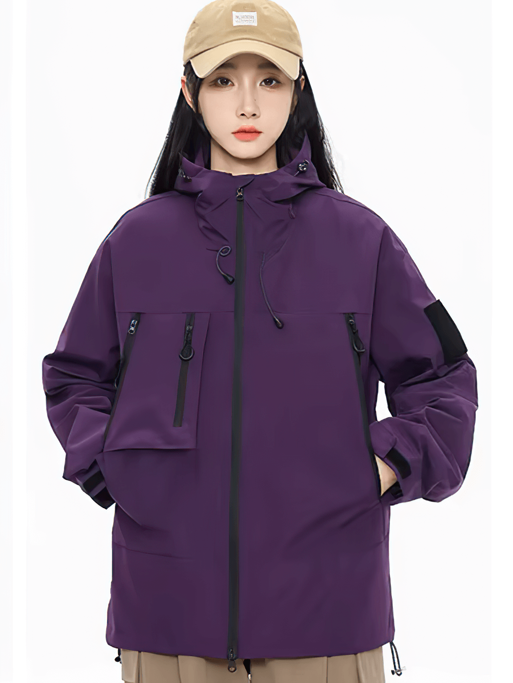 Woman wearing purple waterproof hiking jacket with hood and pockets, perfect for outdoor activities like camping and cycling.