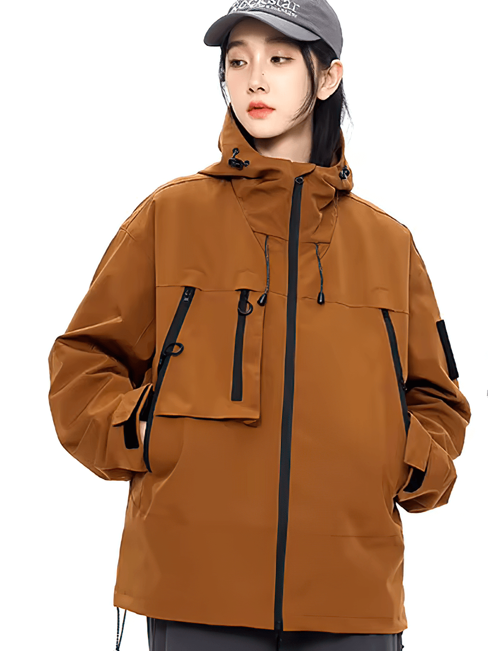 Model wearing a brown waterproof hiking jacket with hood and pockets, perfect for outdoor activities like camping and cycling.