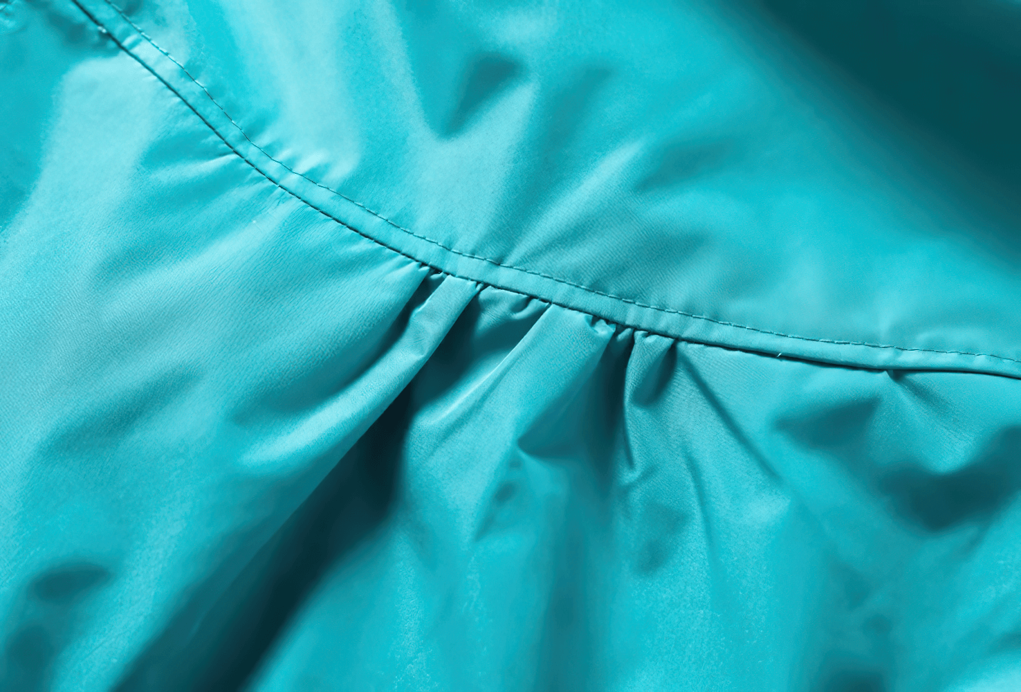 Close-up of fabric on Waterproof Hooded Jacket with Cute Flower Print - SF3597, showing texture and stitching detail.