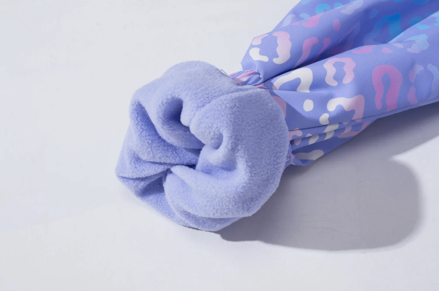 Close-up of Waterproof Hooded Jacket with Pastel Leopard Print - SF3570 showcasing fleece-lined sleeve.