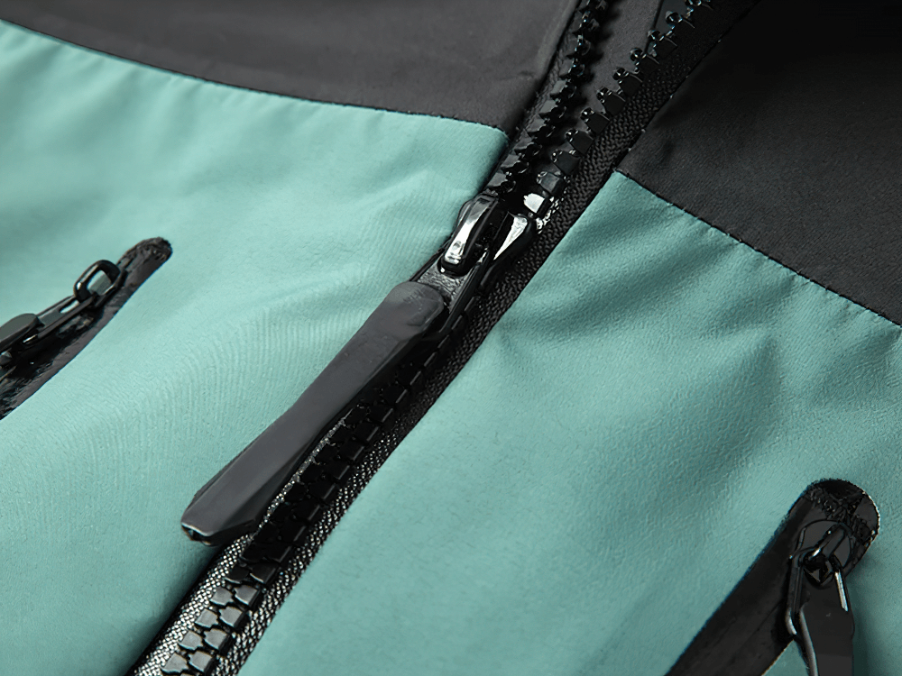 Close-up of zipper on Waterproof Hooded Outdoor Hiking Rain Jacket - SF4217 showing windproof shell design for trekking and camping.