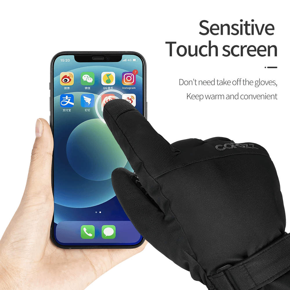 Touchscreen compatible ski gloves for easy smartphone use in winter, showing a gloved hand using a phone screen.