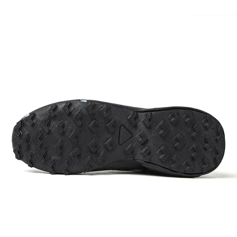 Outsole of Waterproof Non-Slip Men's Lace Up Hiking Shoes showing TPR traction pattern for stability.