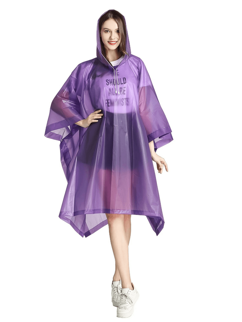 Woman wearing a purple transparent waterproof raincoat, designed for all-weather protection and style.