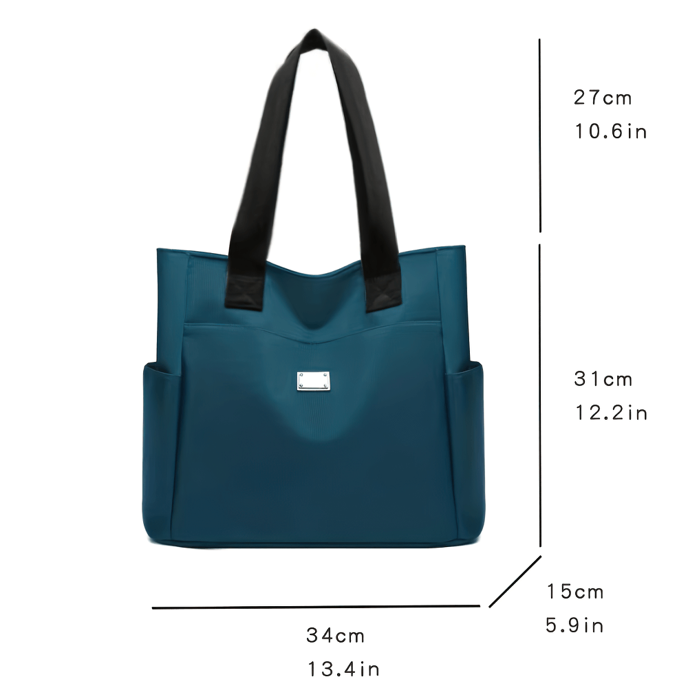 Waterproof nylon shoulder bag with multi-pocket design, in solid blue color, measuring 34cm x 31cm, for stylish and organized daily use.