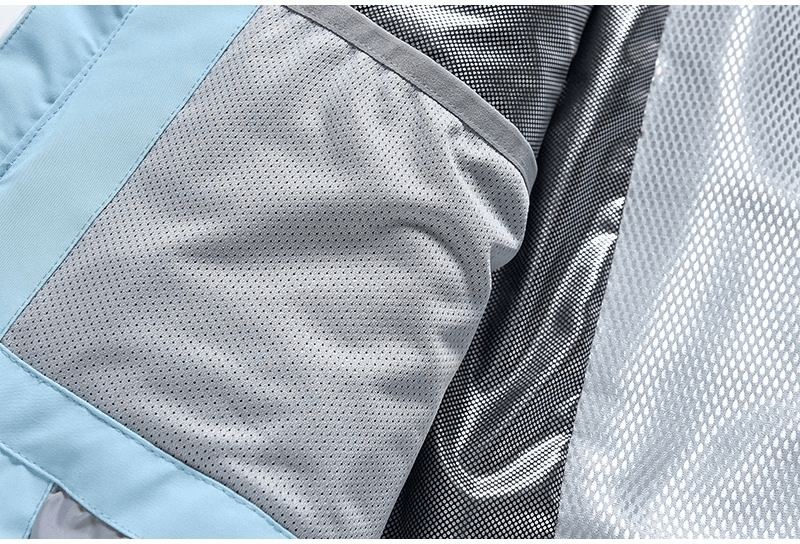 Close-up of breathable mesh lining in a waterproof ski jacket, showcasing its windproof and wear-resistant features for winter sports.