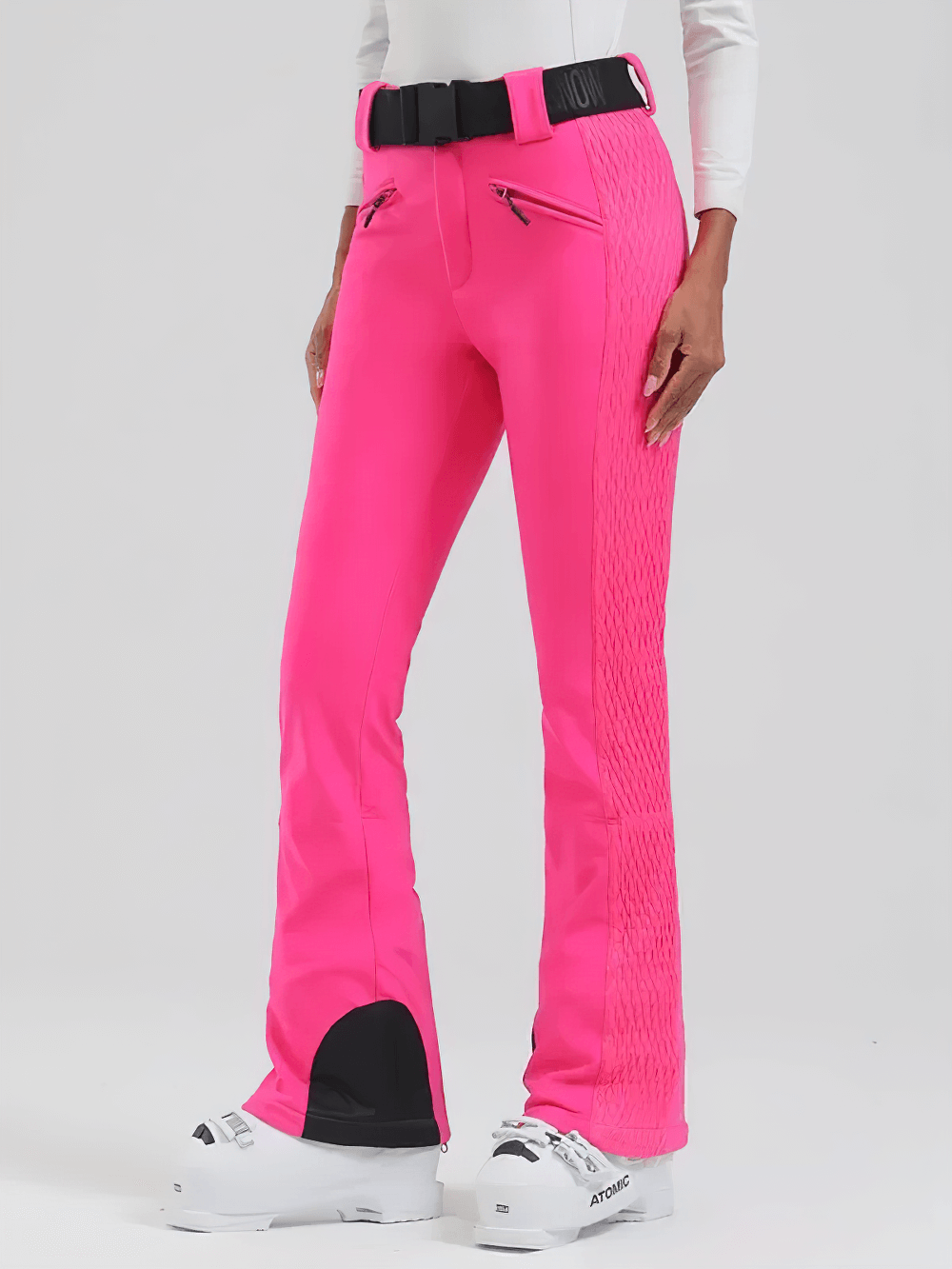 Waterproof Ski Pants with Adjustable Waistband - SF4258 in pink, featuring slim fit, windproof gaiters, and zippered hems over white boots.