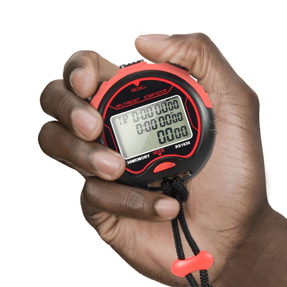 Close-up of hand holding the SF3081 waterproof digital LCD stopwatch for sports with chronograph function.