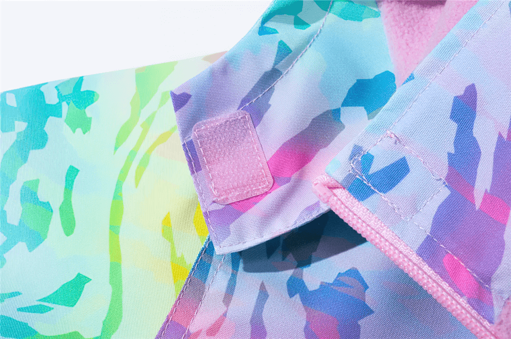 Close-up of vibrant Waterproof Windbreaker Jacket with Fleece Lining - SF3576 showing rainbow fabric design and secure fastenings