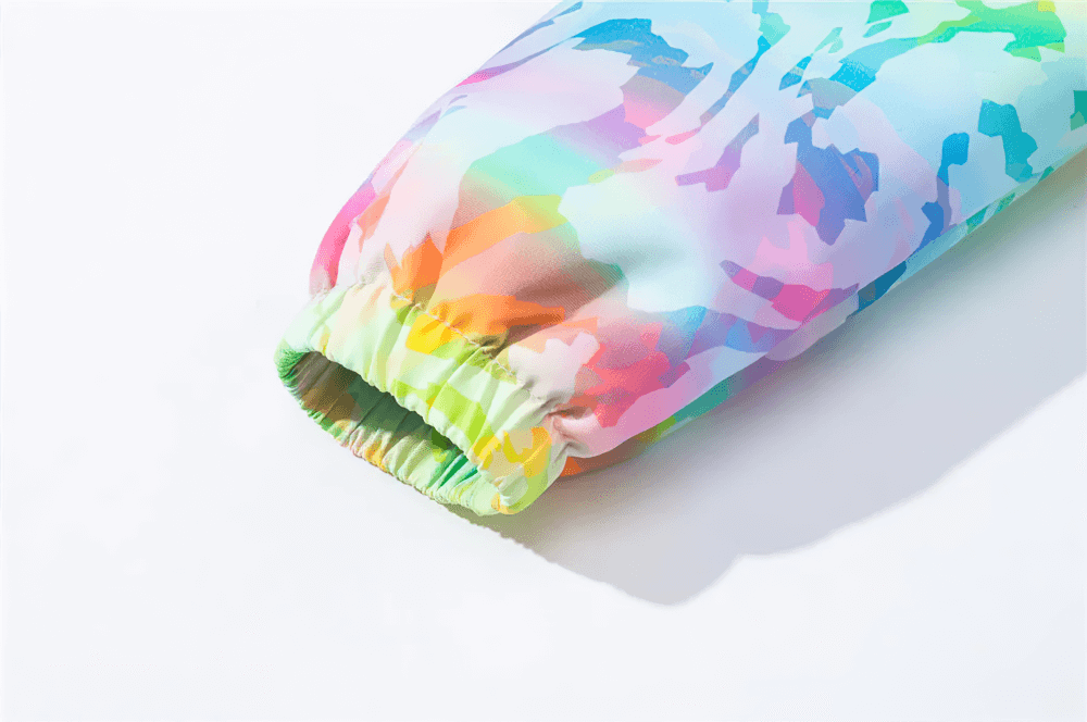 Cuff detail of bright rainbow Waterproof Windbreaker Jacket with Fleece Lining - SF3576 for kids, showcasing colorful and stylish design.