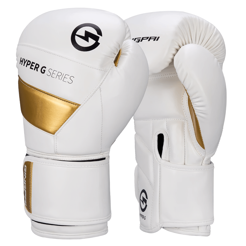 White PU leather boxing gloves with gold accents, perfect for sparring and combat sports, featuring ergonomic fit and secure wrist strap.