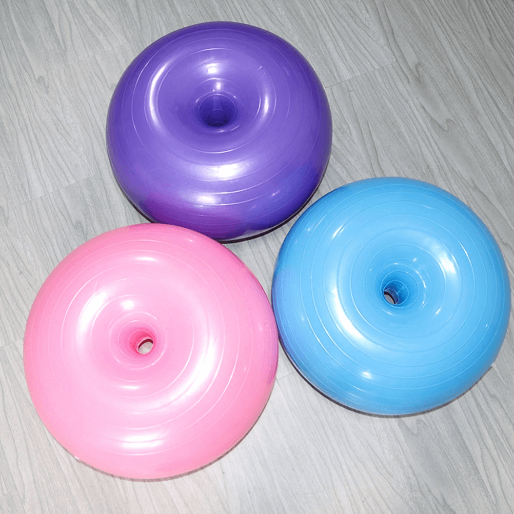 Colorful weighted donut yoga balance balls for stability and core exercises, featuring explosion-proof and non-slip design.