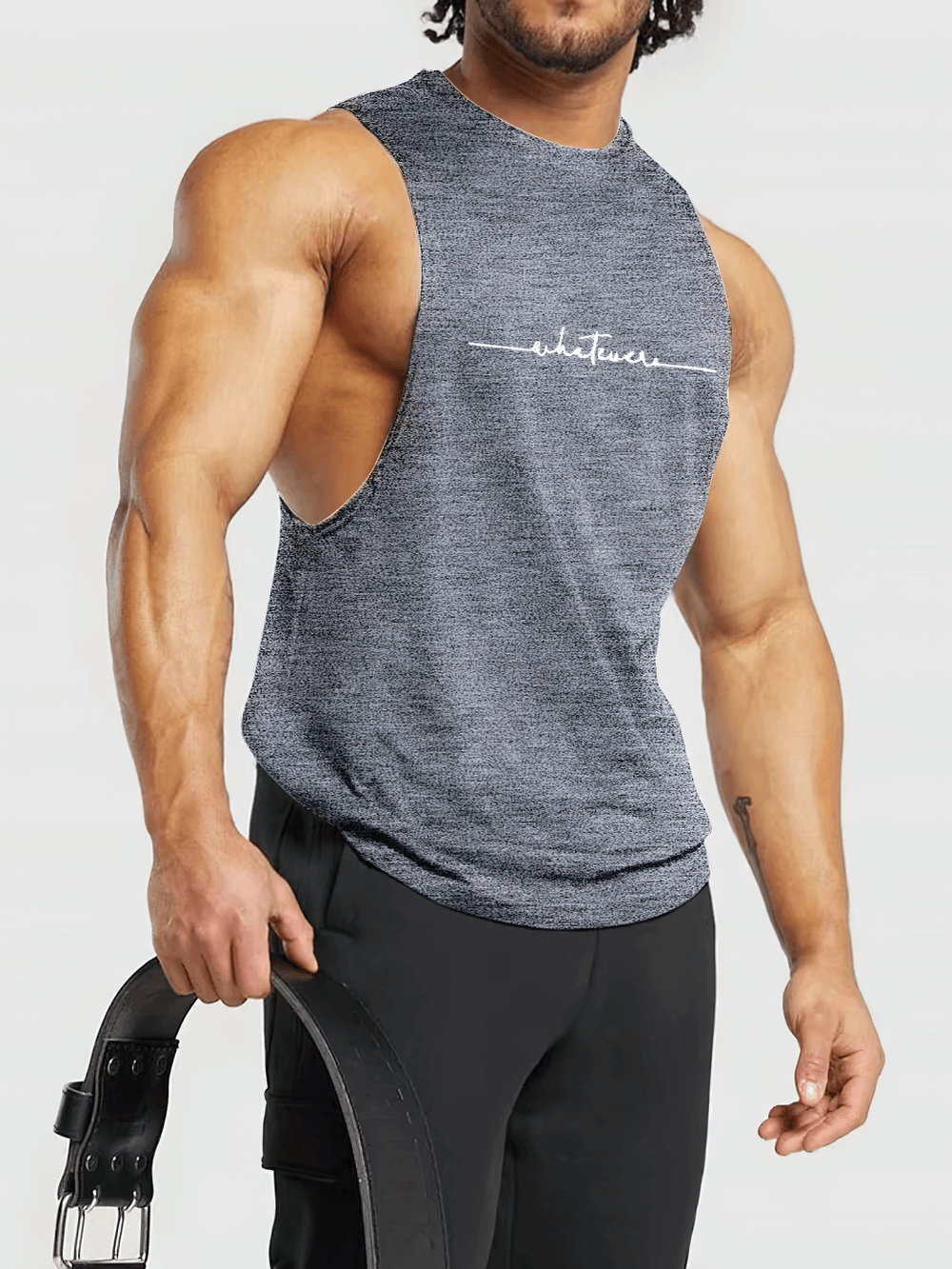 Muscular man wearing Wide Shoulder Fitness Tank Top for Sports - SF4139, holding a workout belt, perfect for gym or outdoor activities