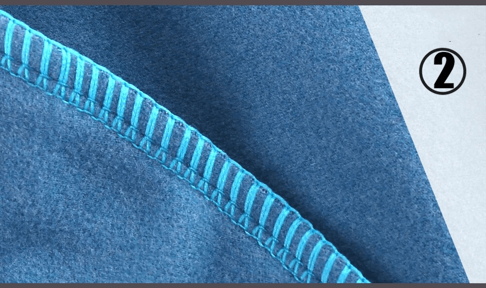 Close-up of the windproof fleece beanie's stitching, highlighting durable seams and soft material in stylish blue.