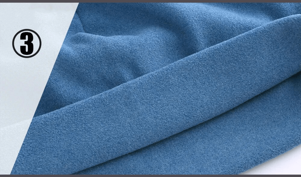 Close-up of blue windproof fleece beanie fabric, highlighting soft and warm texture for sports like cycling and tennis.