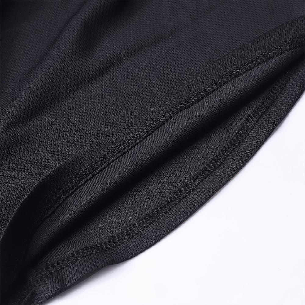 Close-up of flatlock seams on a black windproof ski mask, showcasing durable stitching for comfort and durability.