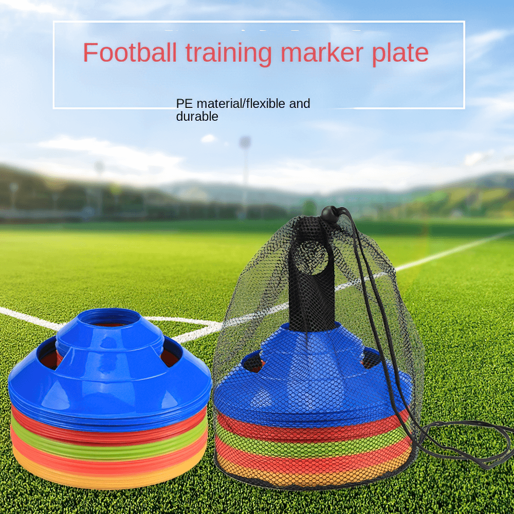 Windproof soccer training marker cones set with carrying bag on a football pitch for agility drills and footwork practice.