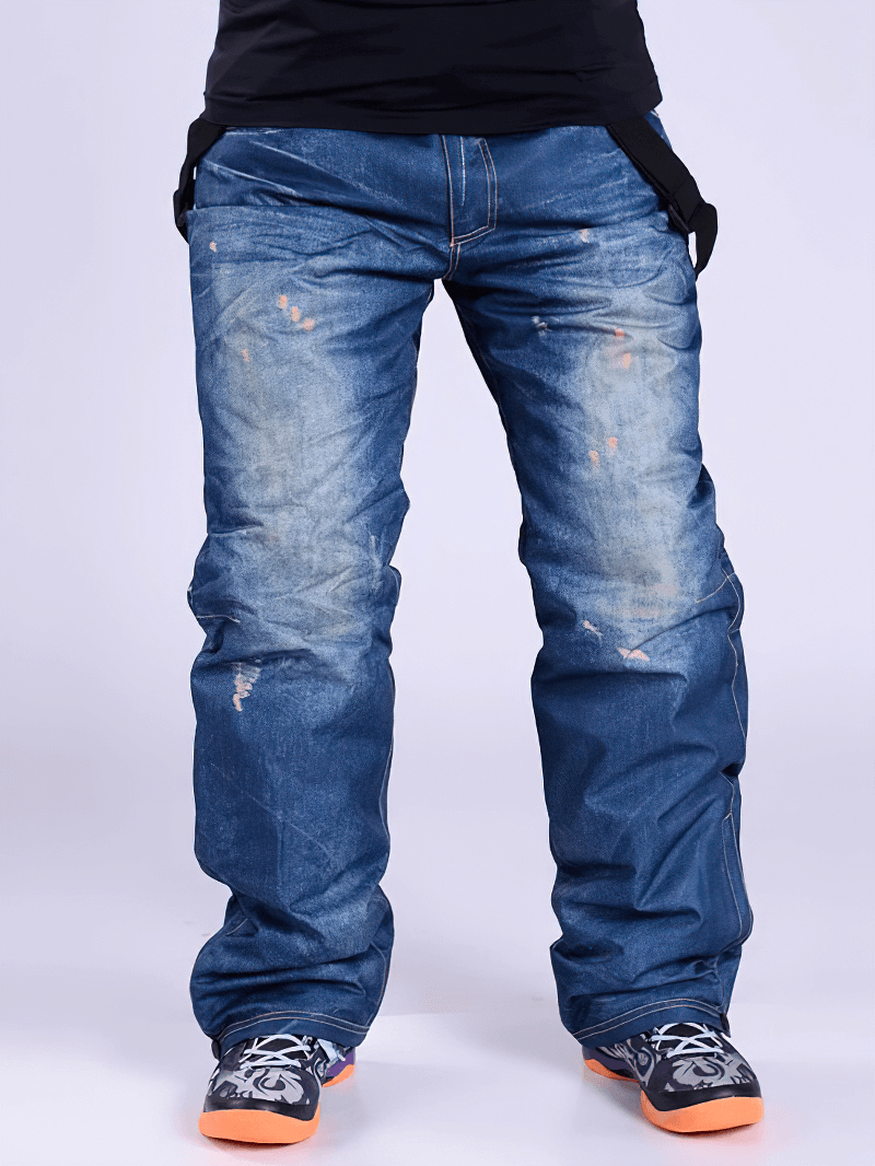 Windproof thermal snowboard denim pants with suspenders, featuring a zipper fly and comfortable fit for cold weather sports.